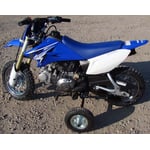 Recalled training wheels mounted on a Yamaha TT-R50