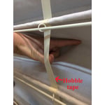 Strangulations can occur between the exposed “hobble tape” (ribbon) and the fabric on the backside of the shade.