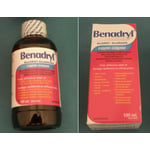 Recalled Benadryl Liquid Elixir, 100 mL bottle and paper box with "X003VRIGUL" on the label