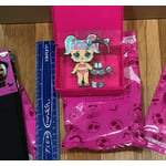 Recalled metal doll pin included in the L.O.L. Surprise! Trick or Treat boxes