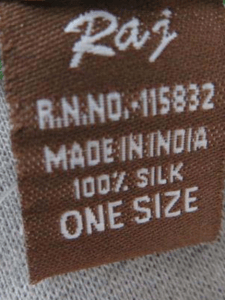 Label located on the scarf’s side seam