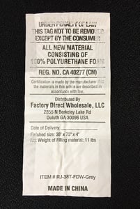Tag located on the side of the mattress.