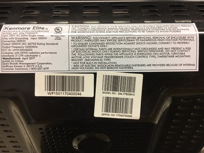 Model and serial numbers on the back of recalled microwave ovens