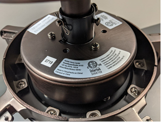 Top of fan motor on recalled Kichler ceiling fans (location of model number)