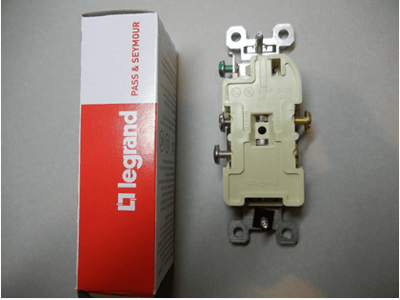 Rear view of recalled receptacle with packaging with arrow pointing to location of date code