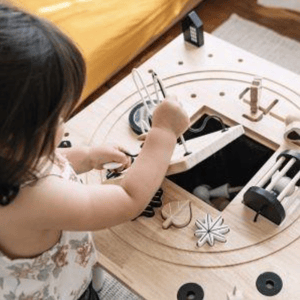 Recalled Wonder & Wise-branded activity table - showing storage pouch