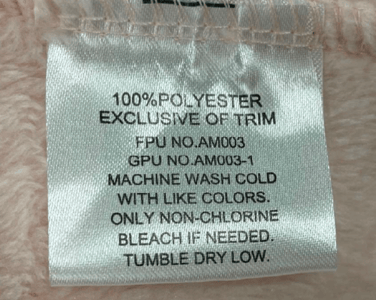 Recalled Riche House children's robe care label
