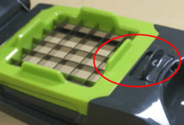 Recalled choppers have locking tabs that can be pushed towards the blades in order to lock into place.