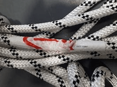 A 2.1-meter scrap of rope taped to one end of an AXIS 11 mm rope
