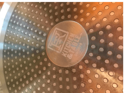 Location of date code on underside of pan.