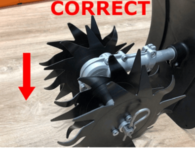 Properly assembled mini-cultivator attachment with the gearbox mounted so that the axle is below the drive tube.