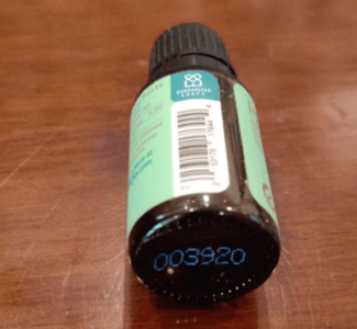 Location of lot code on the bottom of the bottle