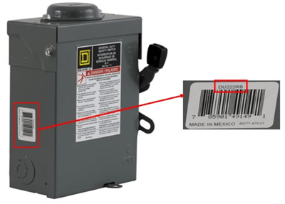 Label on the side of the safety switch with the catalog number
