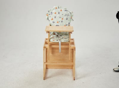 Recalled 2-in-1 Funlio Convertible Baby High Chair with forest-themed padded seat