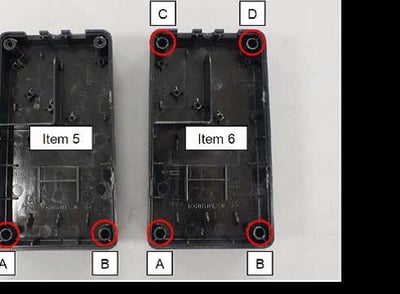 Example of broken screw receptacles from power supply cover