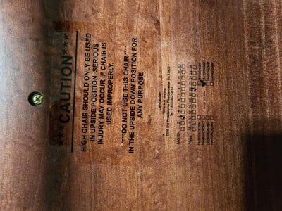 Model numbers printed on the underside of the seat bottom