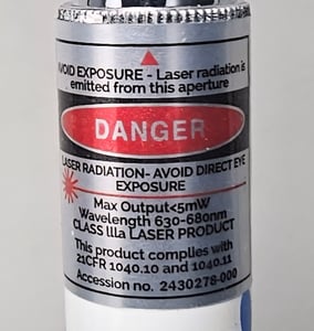 "Danger" and "Accession No. 2430278-000" are printed on a silver label located on the laser pointer tube
