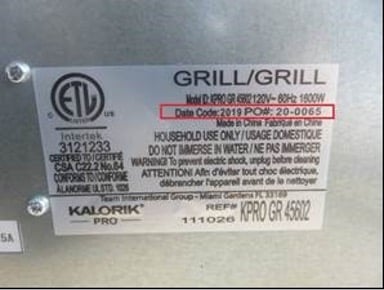 Label on the back of the recalled grills shows Date Code, PO# and Model KPRO GR 45602