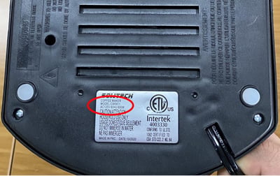 Bottom of recalled SOWTECH Espresso Machine with label displaying "Model CM6811"