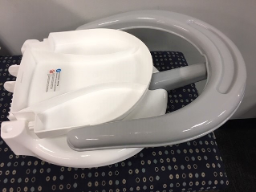 Warning Sticker on Recalled BATTOP Foldable Infant Bath Seats