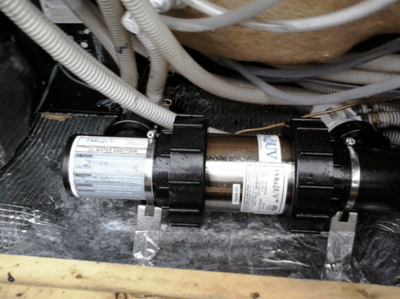 Delta UV model EA-4H-5 generator, installed in a hot tub's cabinet interior.