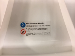 Warning Sticker on Recalled BATTOP Foldable Infant Bath Seats
