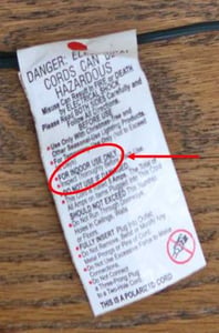 Warning label on the cord indicates “FOR INDOOR USE ONLY.”