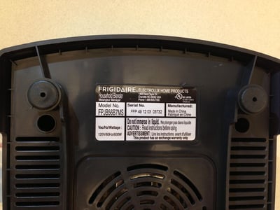 Serial plate with model and serial numbers on bottom of unit