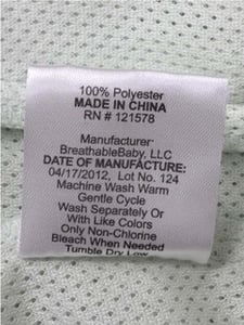 Tag with DATE OF MANUFACTURE 04/17/2012 and Lot No. 124