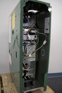 The model number and manufacturing date are located on a silver label on the inside of the right side panel.