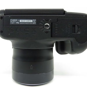 Side view of serial number plate on the Canon PowerShot SX50 HS Digital Camera