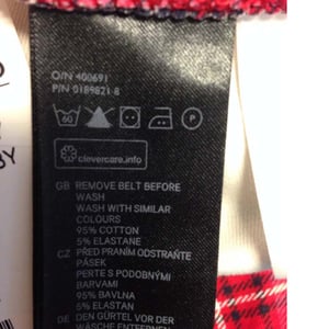 Black Care Label (front of care label with O/N and P/N number)