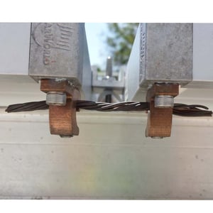 Improper Bare-Copper Lugs Installed on Roof