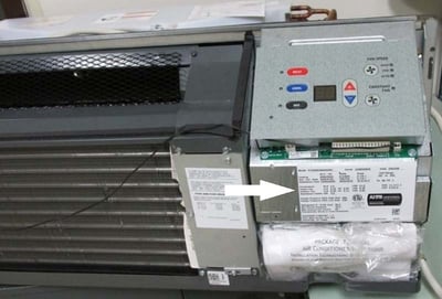 Model and serial numbers can be found by lifting the unit’s front cover.