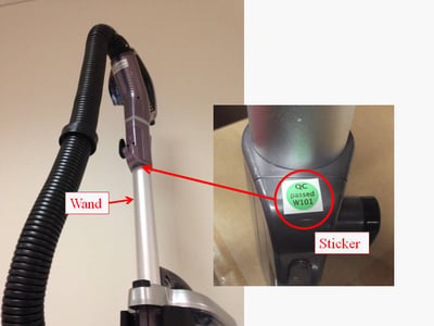 Location of sticker on vacuum cleaner