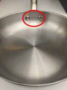 Metal discs covering rivet