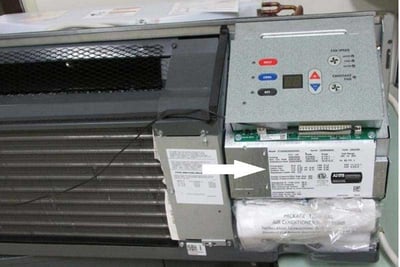 Model and serial numbers can be found by lifting the unit’s front cover.