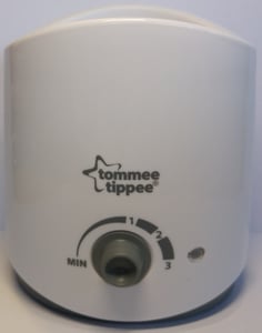“Min” or “0” is stamped on the left-hand side of the bottle and food warmer’s control dial