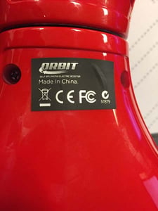 Orbit is printed on a black sticker on the underside of the hoverboards