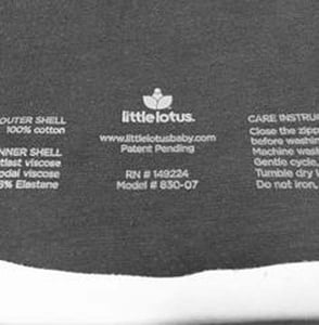 The Little Lotus baby logo and model number are stamped in white at bottom in the interior of the swaddle and sleeping bag.