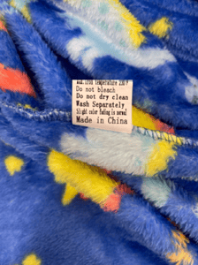 Recalled BTPEIHTD children's robe's side seam label