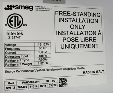 "Made in Italy", the model, and serial numbers are printed on a white label inside of the refrigerator's top door