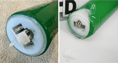 Recalled Light‑Up Foam Stick (Item No. SS041‑M) – End of stick showing accessible button cell batteries.