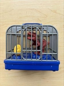 Recalled Dinosaur Toy Containing Electronic Gray and Blue Cage with a Red Dinosaur