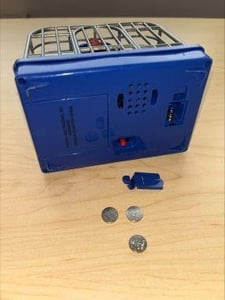 Recalled Dinosaur Toy Easily Accessible Battery Compartment