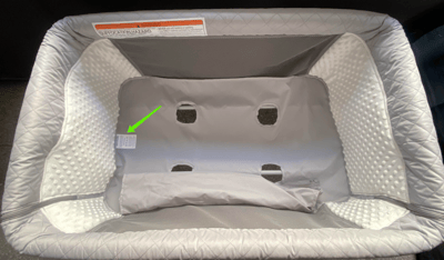 "Product Model: QX-831" is printed on a label located on bottom of the convertible bassinets underneath the mattress pad