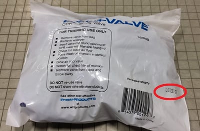 Location of the lot number on Work ‘N Leisure Practi-Valve 10/bag