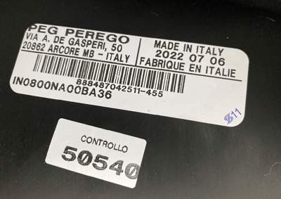 Label with date of manufacture and model number located in hood of recalled bassinets