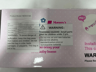 Recalled Baby Doll Playset – front package label with model number