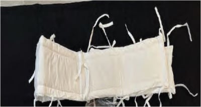 Recalled Padded Crib Bumper in the Color of White